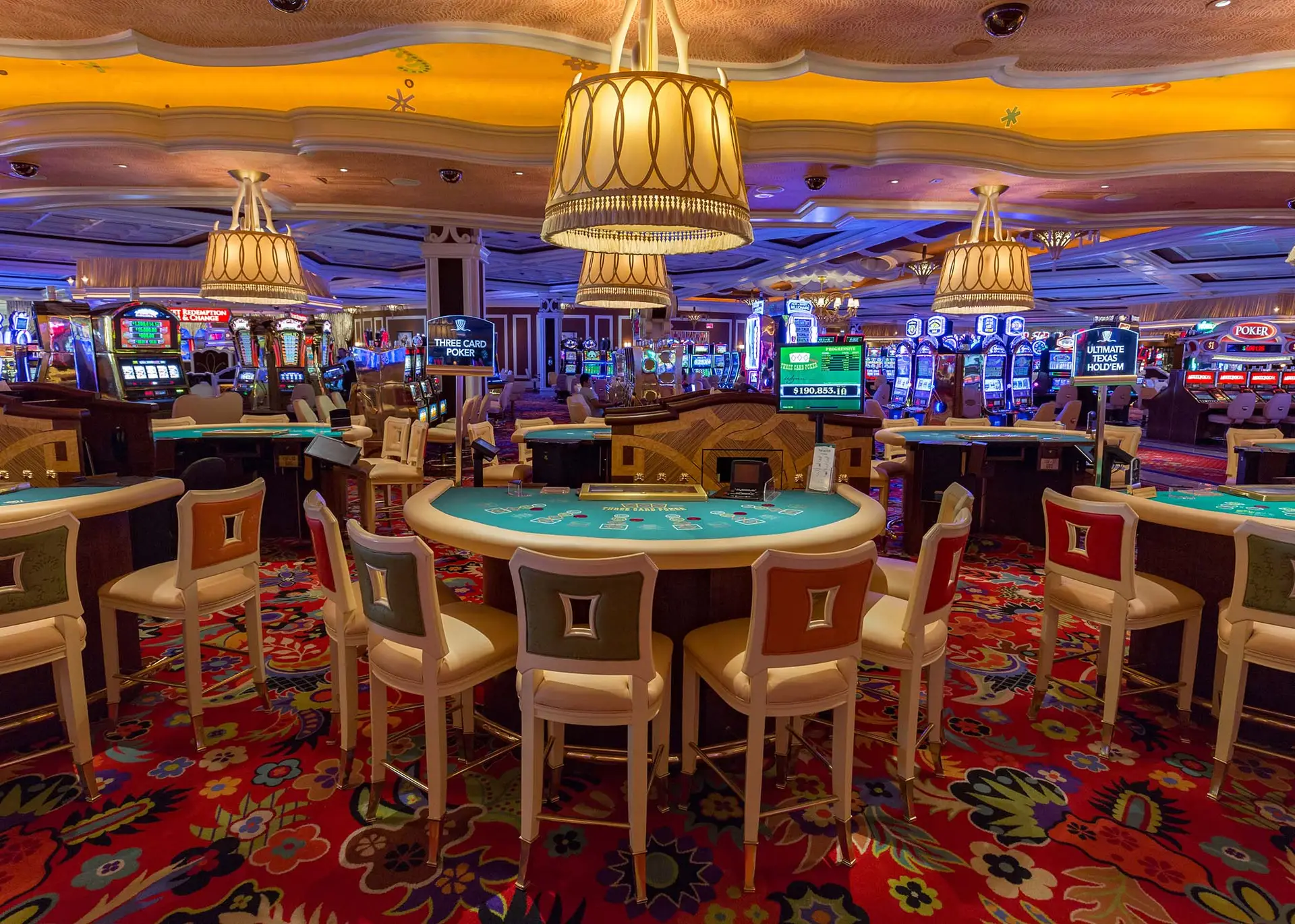 casino slot machines in gaming floor environment with players