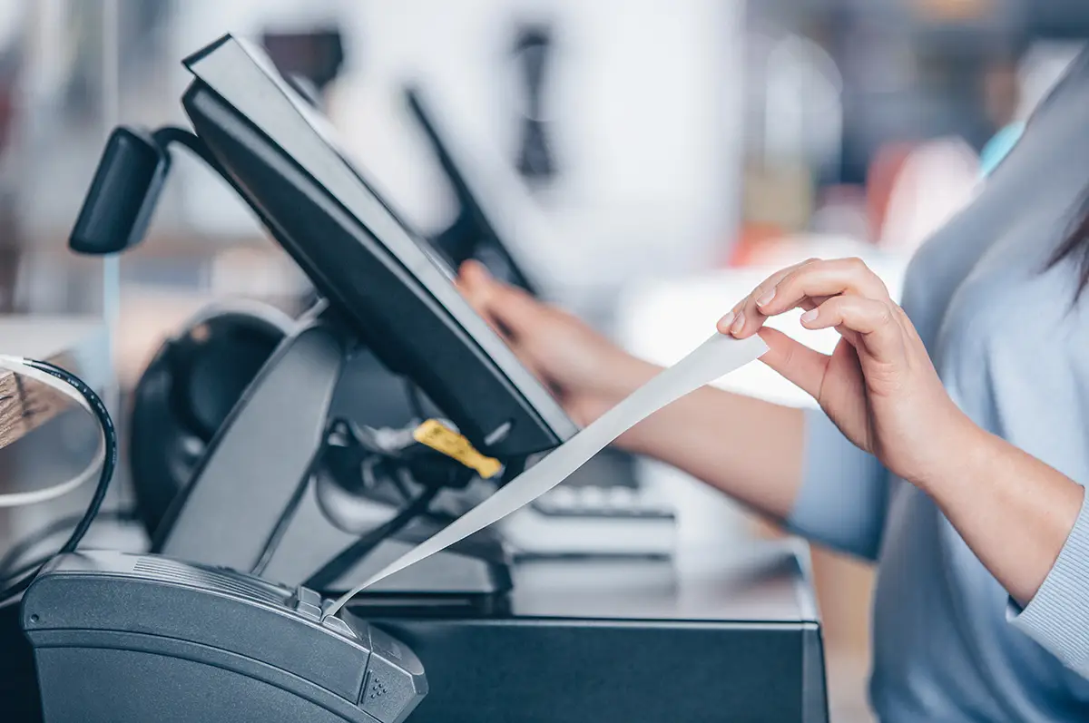 POS receipt printer printing a retail transaction
